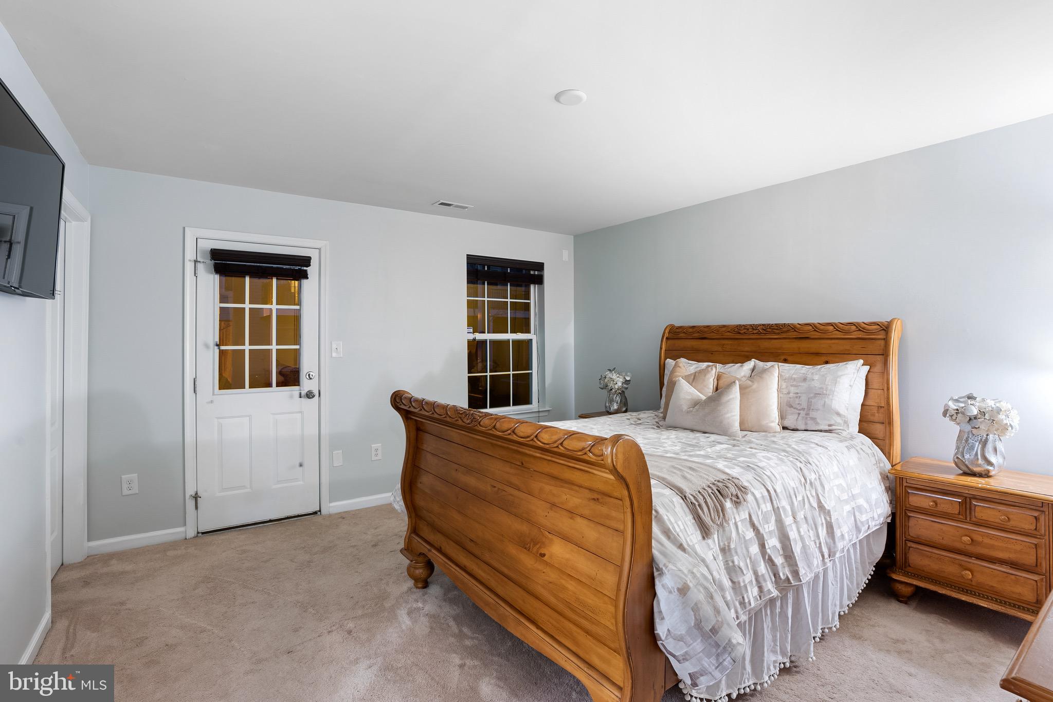 8022 Ravenclaw Road Elkridge, MD 21075 - Photo 20 of 24 Entry Level Bed # 4 | Ensuite Bath | Patio Access.