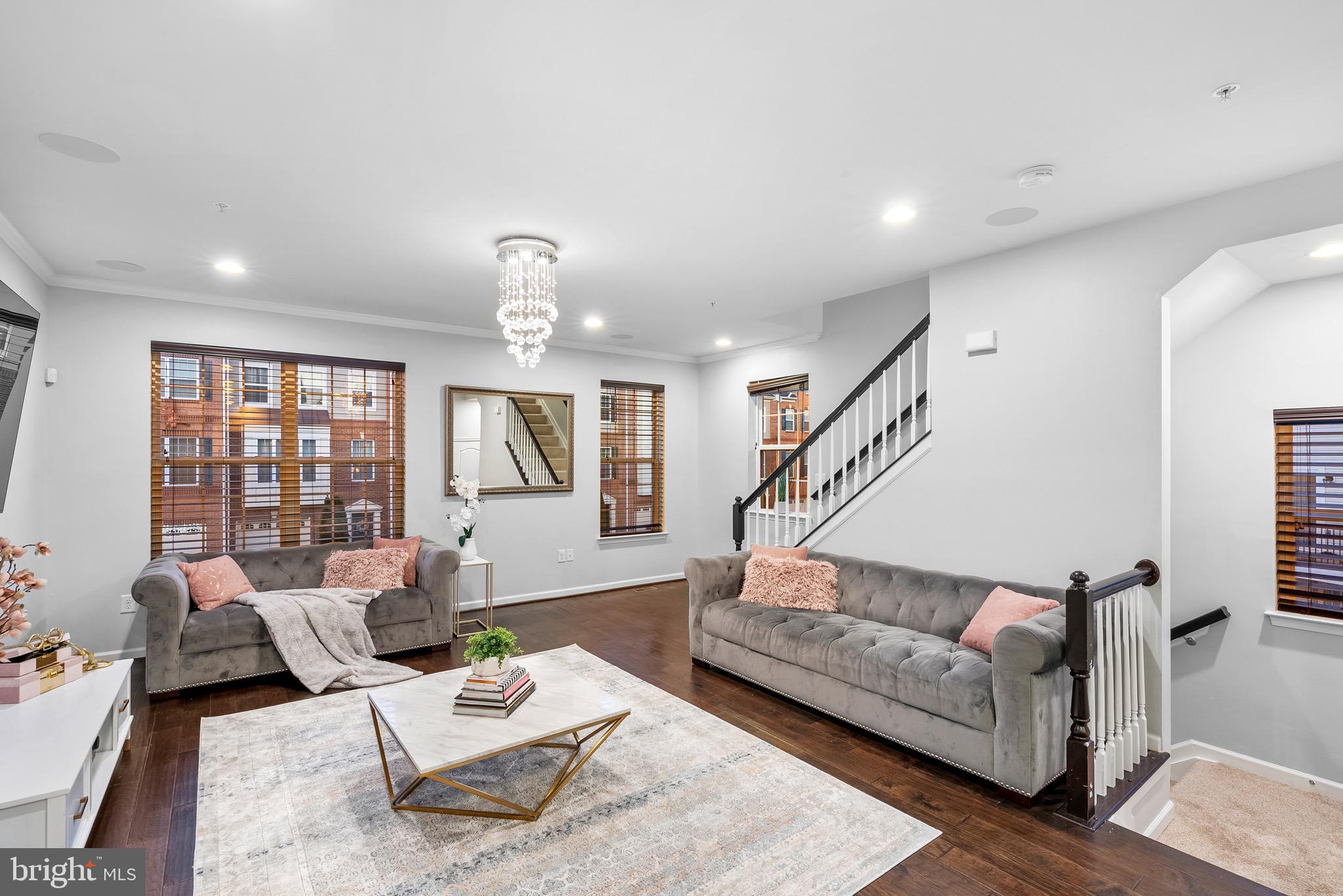 8022 Ravenclaw Road Elkridge, MD 21075 - Photo 8 of 24 Family Area | Hardwood Floors | Window Treatments.