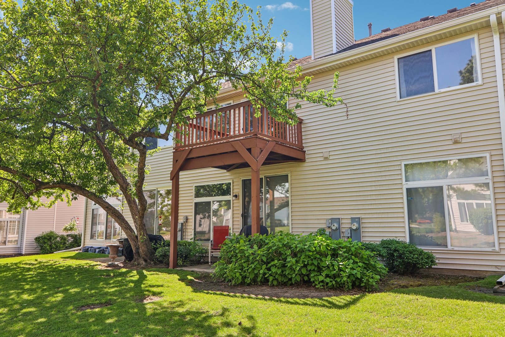 1064 Ripple Ridge Darien, IL 60561 - Photo 14 of 16 a view of a house with a yard and plants