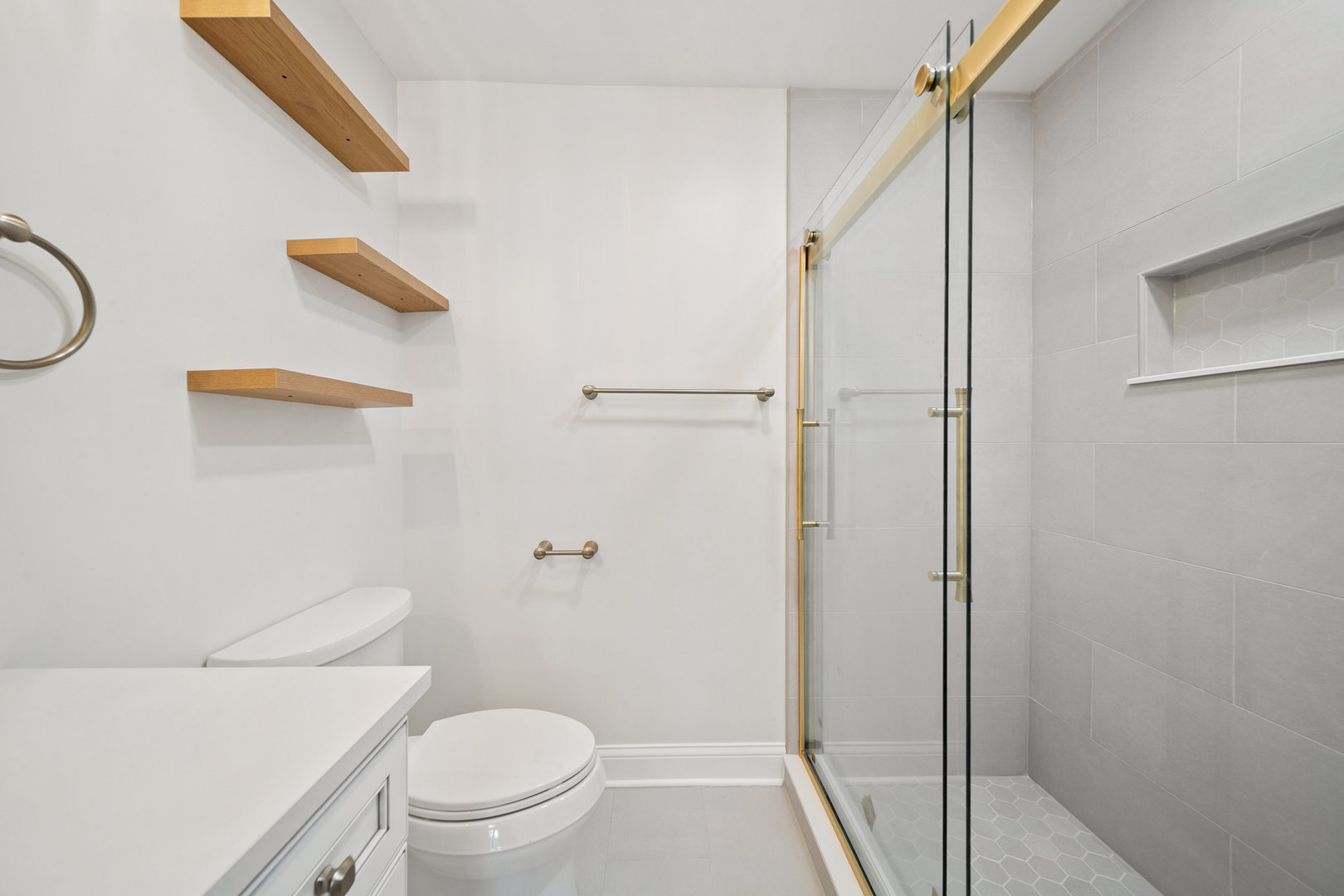 1601 Fowler Avenue Evanston, IL 60201 - Photo 18 of 33 a white toilet sitting next to a bathroom sink