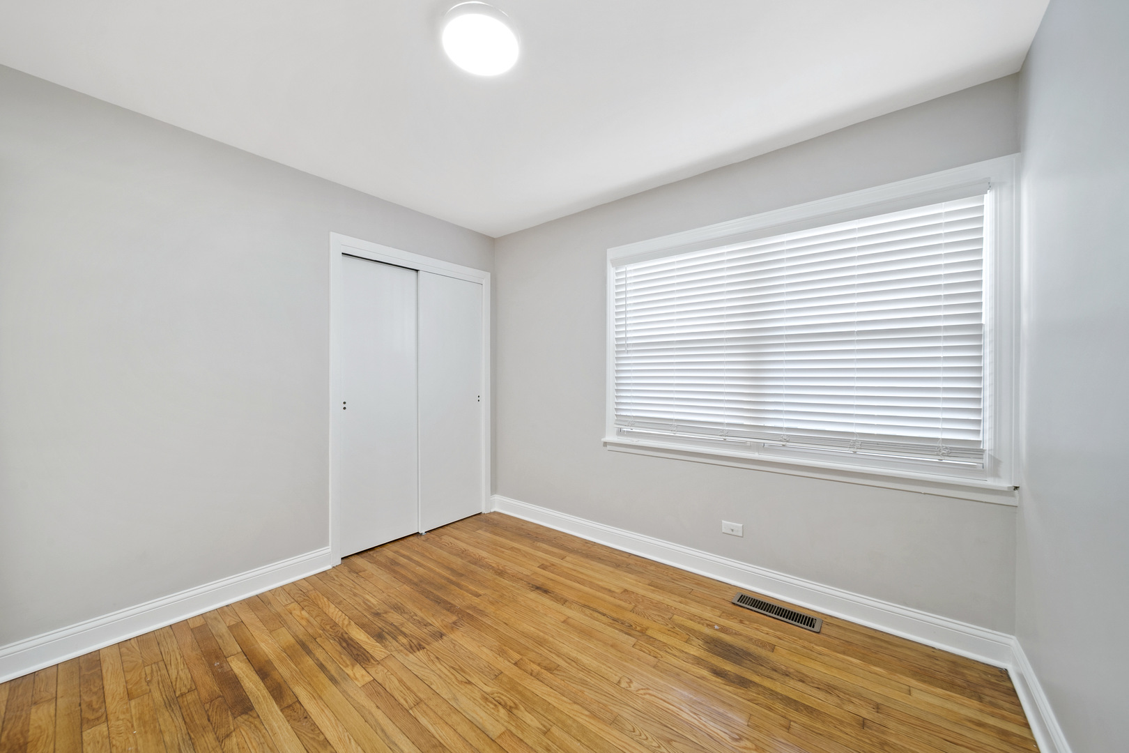 1601 Fowler Avenue Evanston, IL 60201 - Photo 20 of 33 a view of a room with wooden floor and a window