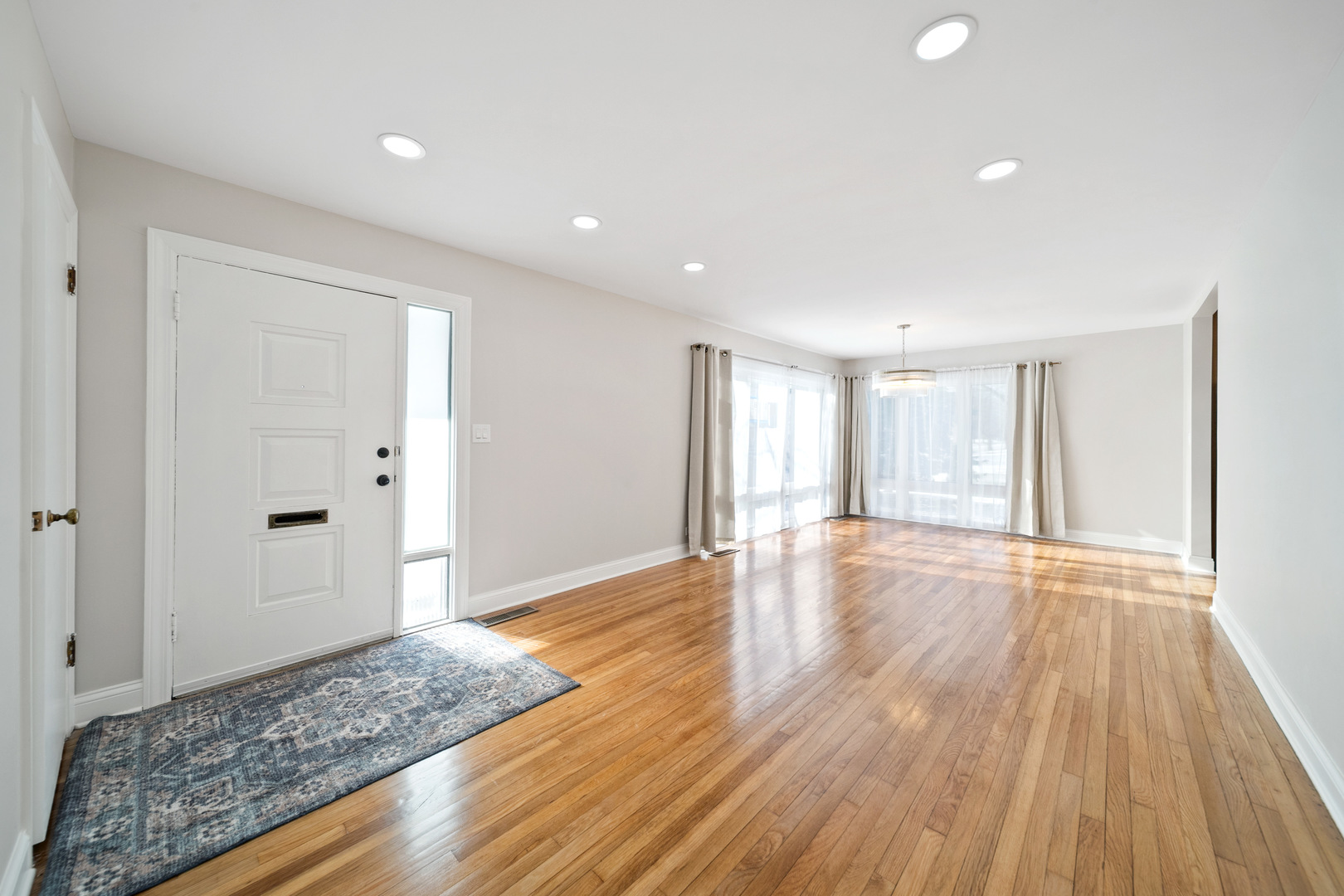 1601 Fowler Avenue Evanston, IL 60201 - Photo 6 of 33 a view of an empty room with wooden floor and closet