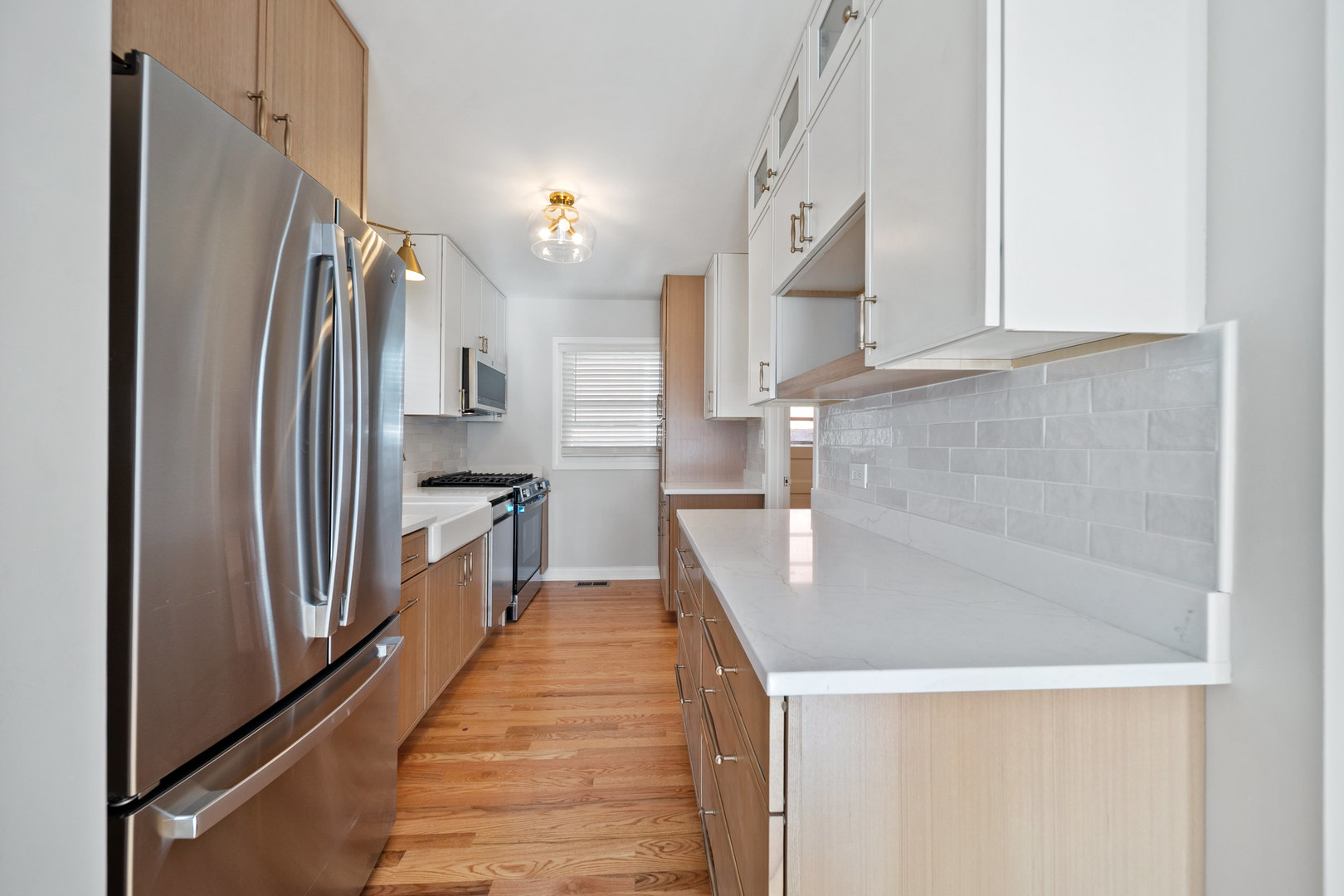1601 Fowler Avenue Evanston, IL 60201 - Photo 9 of 33 a kitchen with stainless steel appliances granite countertop a refrigerator a sink and a stove