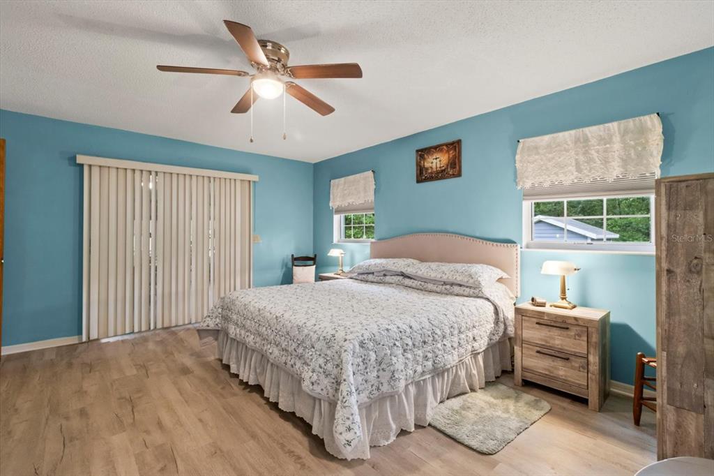 3550 South Dean Terrace Inverness, FL 34452 - Photo 21 of 37 a bedroom with a bed and a large window