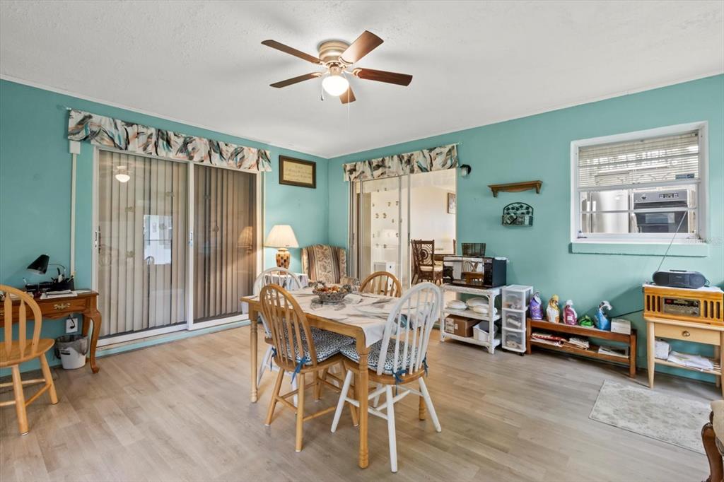 3550 South Dean Terrace Inverness, FL 34452 - Photo 25 of 37 a view of a dining room with furniture window and wooden floor