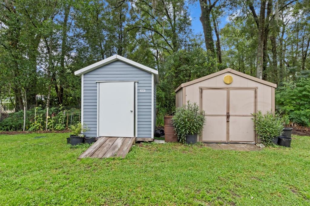 3550 South Dean Terrace Inverness, FL 34452 - Photo 33 of 37 a front view of a house with a yard and trees