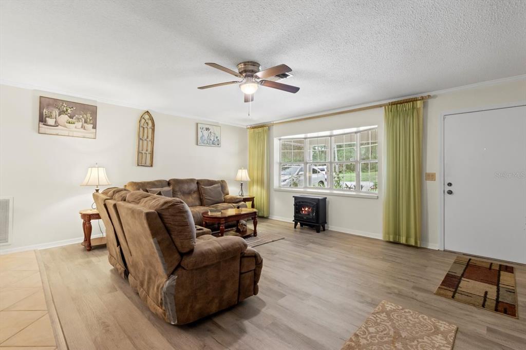 3550 South Dean Terrace Inverness, FL 34452 - Photo 9 of 37 a living room with furniture and a large window