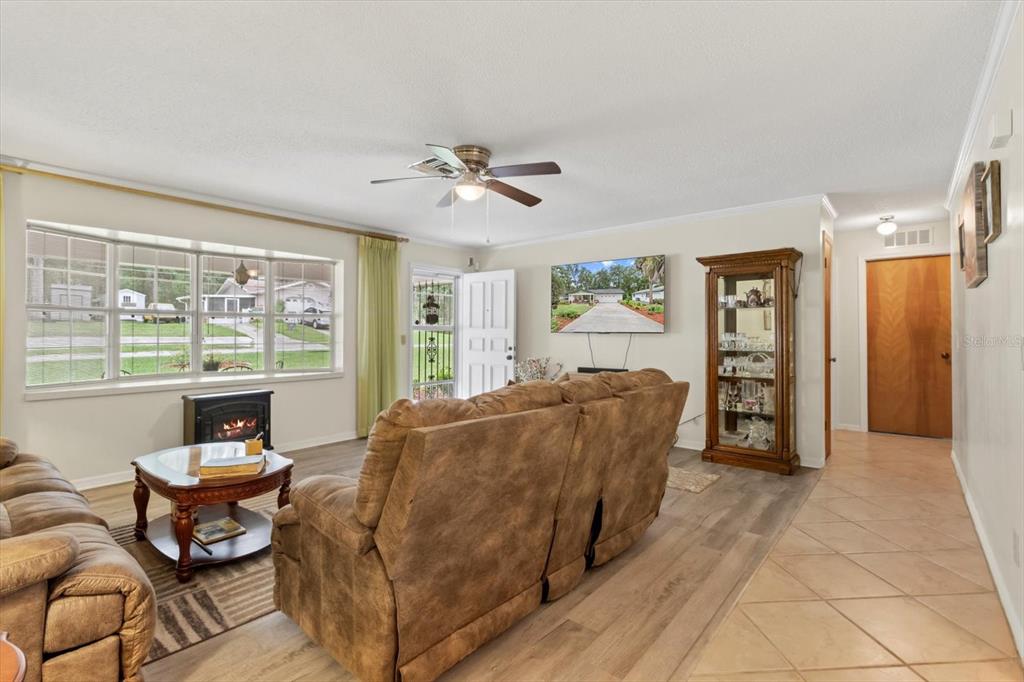 3550 South Dean Terrace Inverness, FL 34452 - Photo 10 of 37 a living room with a bed furniture and a large window