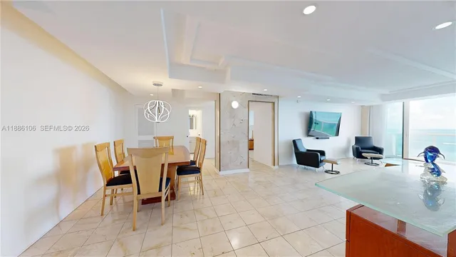 a view of a dining room with furniture