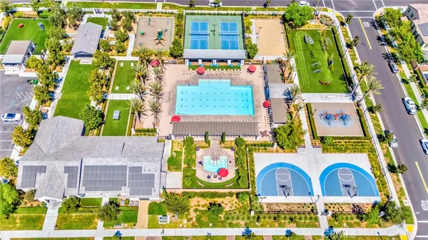 a view of a swimming pool with a lounge chairs