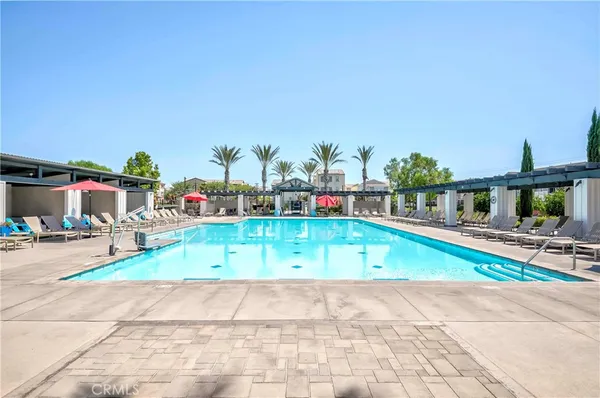 a view of swimming pool with a patio
