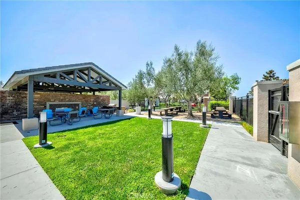 a view of a park with houses