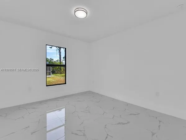 an empty room with windows