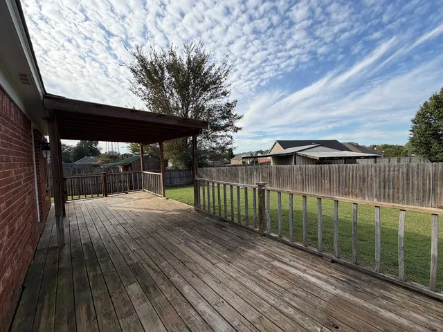 a view of backyard with green space