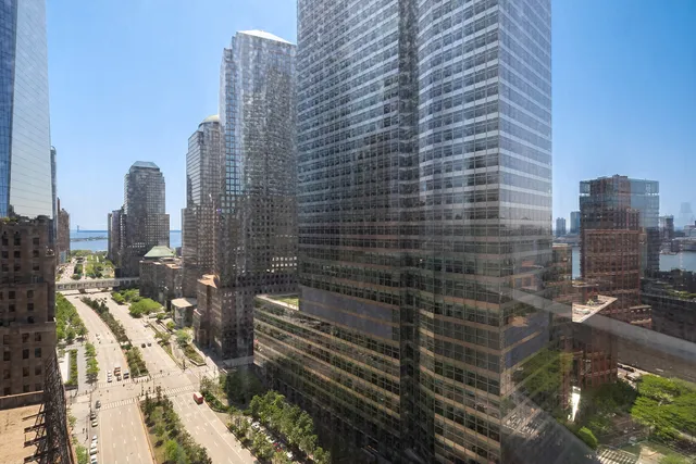 a view of a city with tall buildings