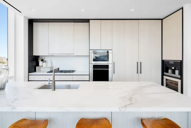 a bathroom with a bathtub and a sink