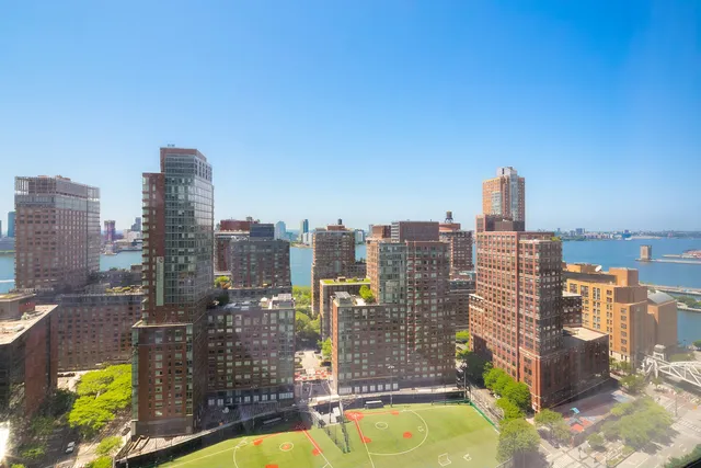 a view of a city with tall buildings