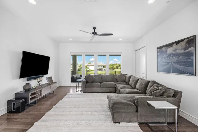 a bedroom with a bed a desk and chair