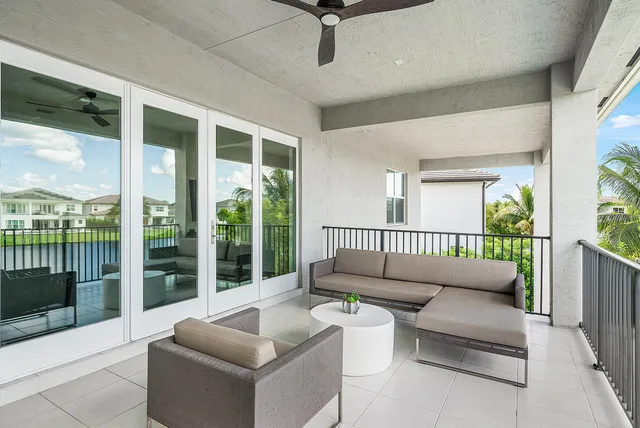 a view of a city from a dining room with furniture window and outside view