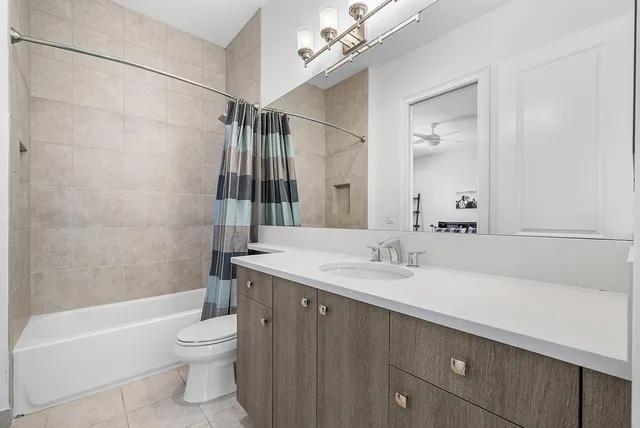 an aerial view of a house with a swimming pool yard and outdoor seating