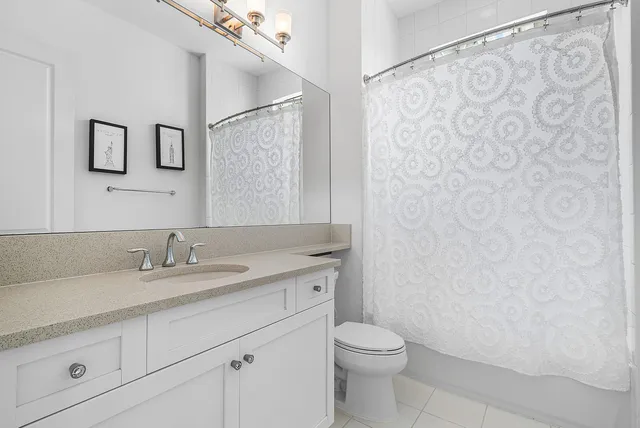 a view of a swimming pool with an ocean view