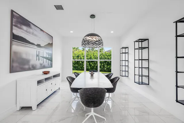 a view of an entryway and livingroom with furniture