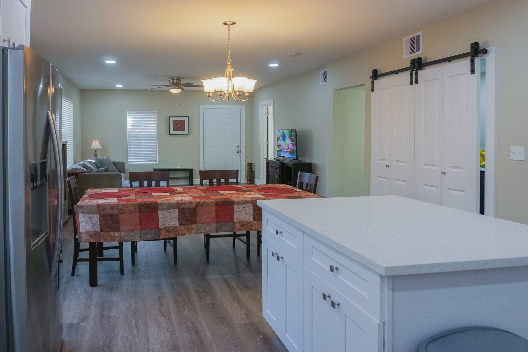 3703 Market Street, Unit 1 Houston, TX 77020 - Photo 7 of 23 The dining area features a table along with an island that includes two bar stools.
