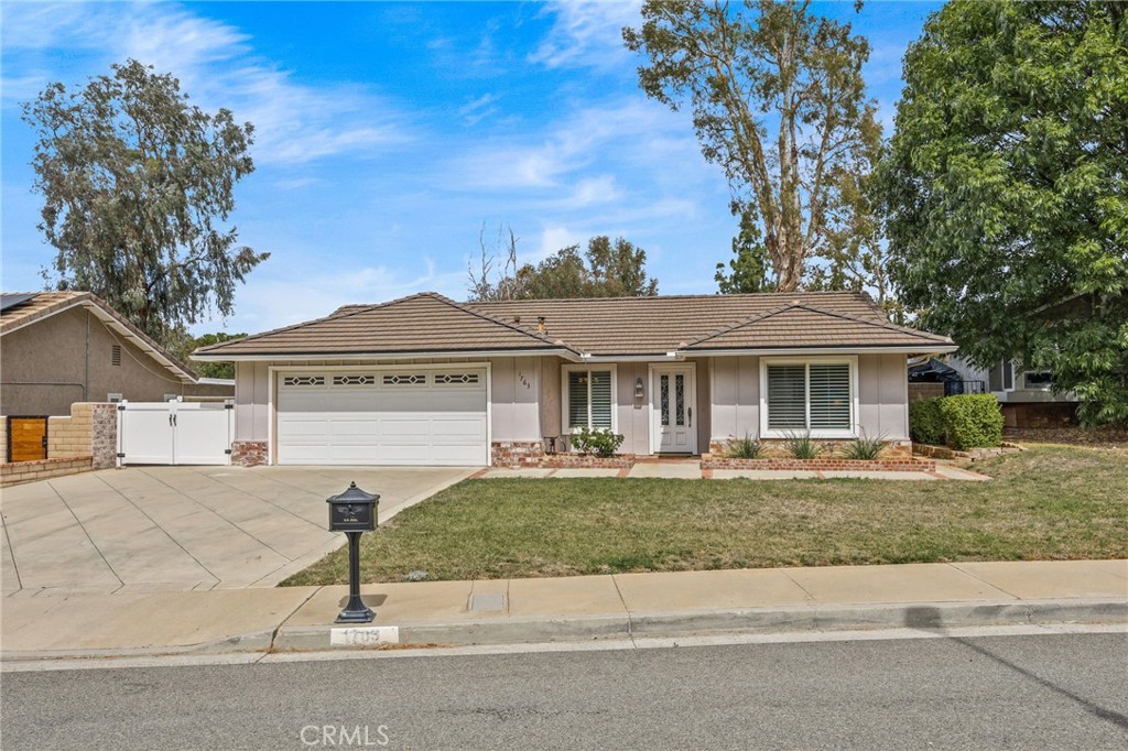 1763 Gleason Street Corona, CA 92882 - Photo 2 of 41 front view of a house with a yard