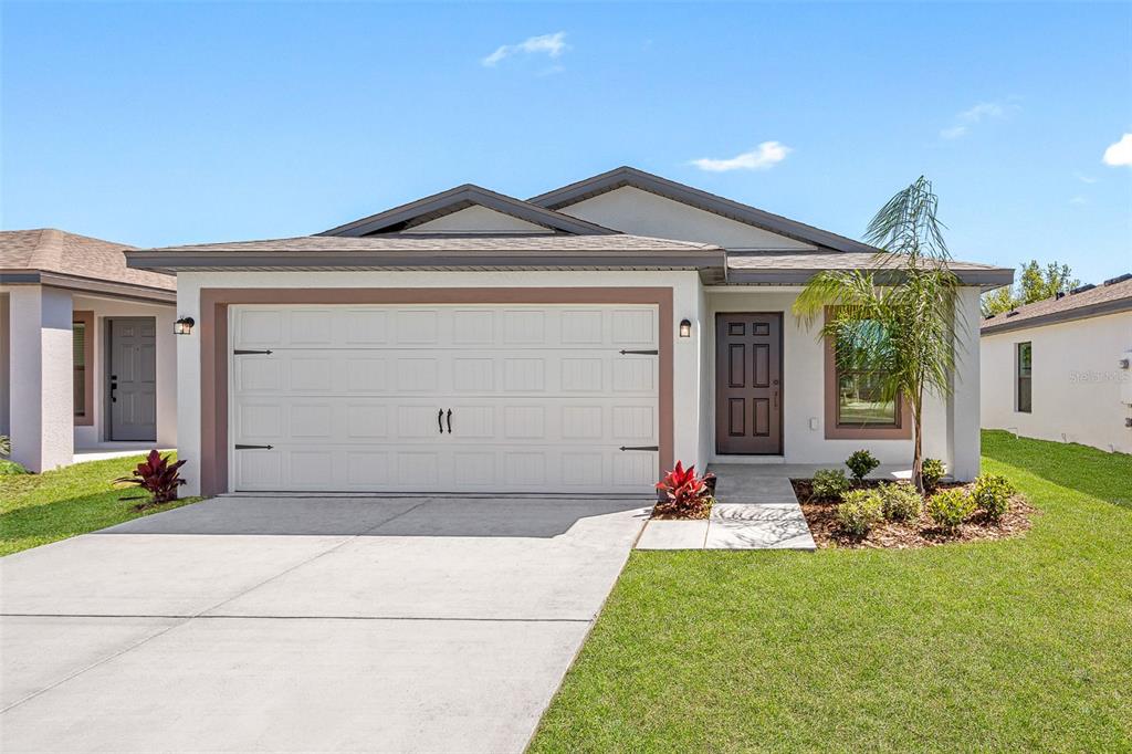 15108 Chimney Swift Road Weeki Wachee, FL 34614 - Photo 1 of 1 a front view of house with yard