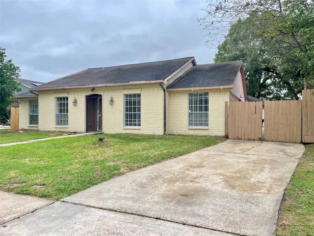 front view of a house and a yard