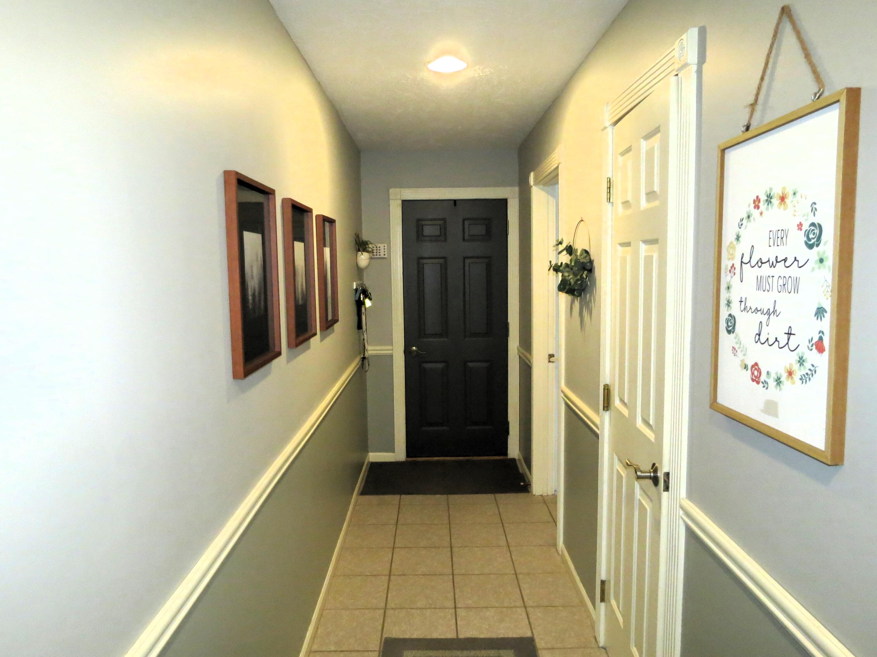 4922 Country Lane Jackson, MI 49201 - Photo 25 of 70 Hall to laundry and powder room