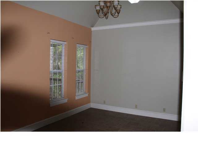 370 Mallet Bayou Road Freeport, FL 32439 - Photo 6 of 12 a room with a window and wooden floor