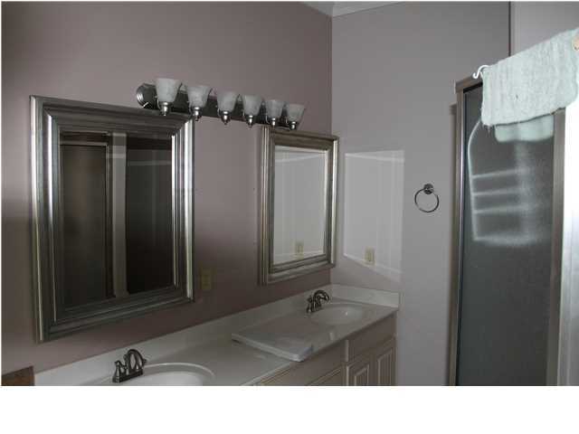 370 Mallet Bayou Road Freeport, FL 32439 - Photo 9 of 12 a bathroom with a sink and a mirror