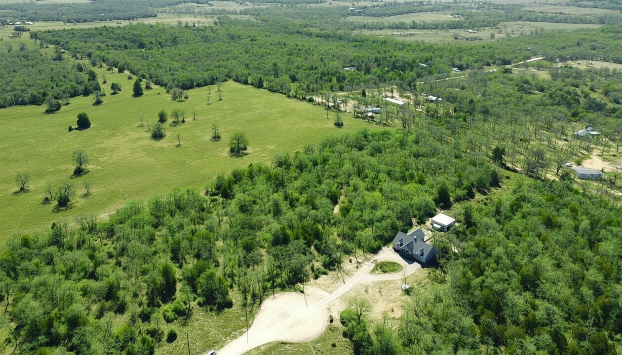 Lot 25 Oakview Lane Thrall, TX 76578 - Photo 8 of 11 a view of a garden with a tree