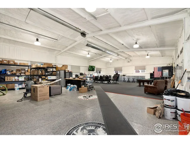 a living room with lots of furniture and a view
