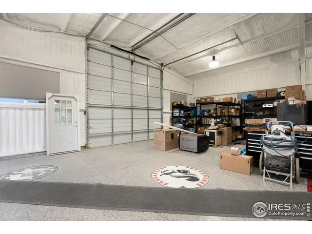 a living room with lots of furniture and clutter