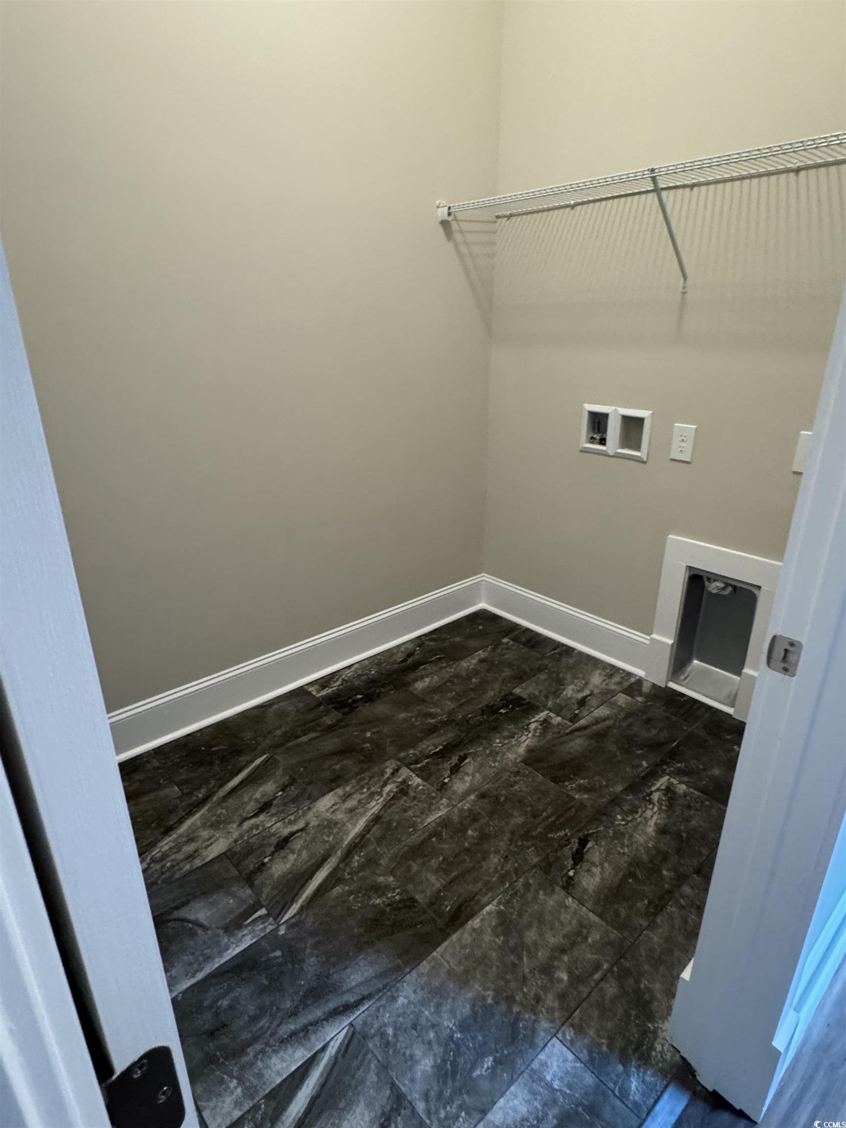 852 Iris Street, Unit D Myrtle Beach, SC 29577 - Photo 14 of 36 Laundry room with baseboards and washer hookup