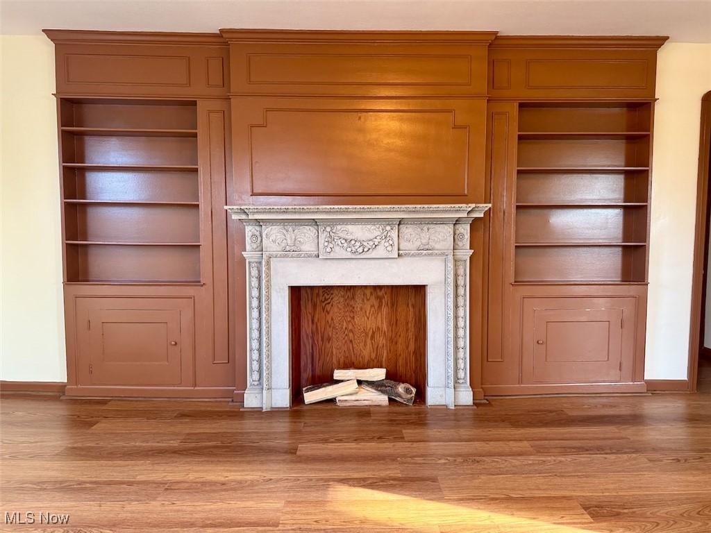 4595 Tiedeman Road Cleveland, OH 44144 - Photo 11 of 29 Lliving room with light wood flooring and built in features