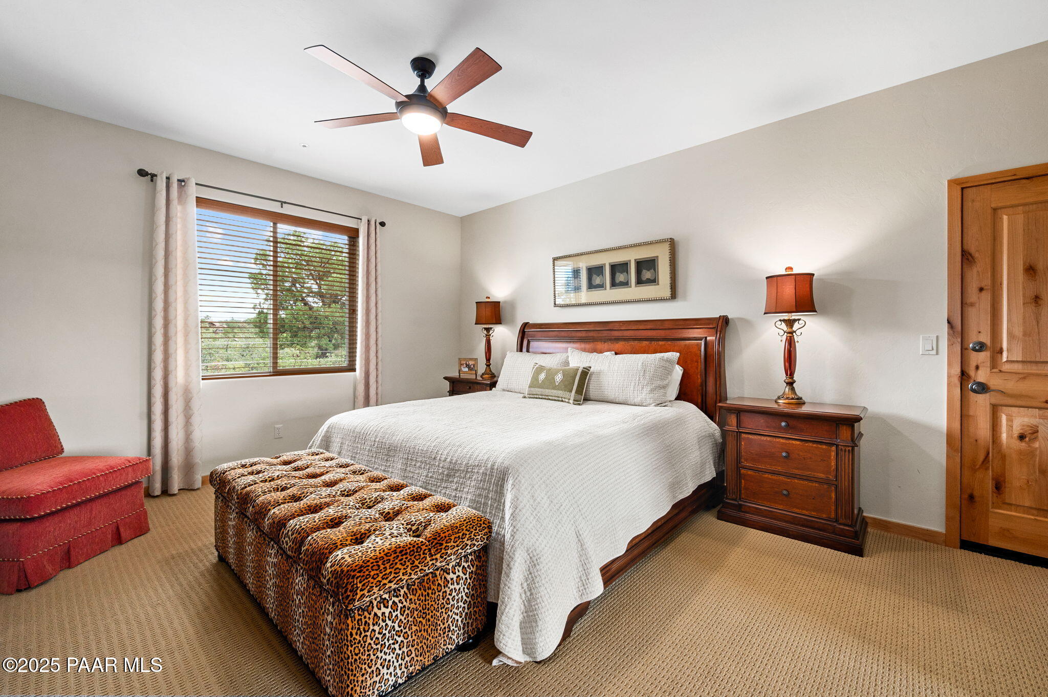 2214 Lichen Ridge Lane Prescott, AZ 86303 - Photo 29 of 46 a bedroom with a bed and a couch