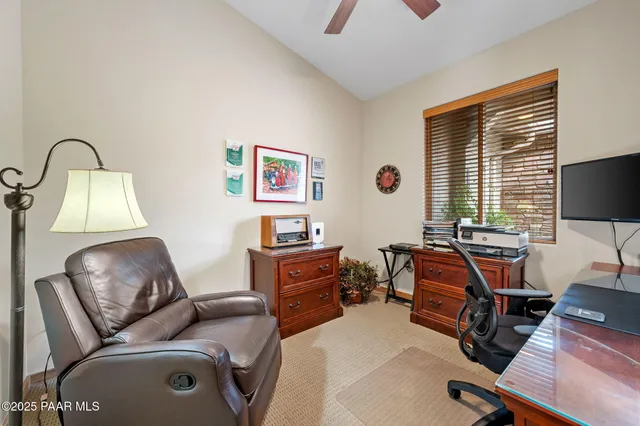 a room with furniture and a window