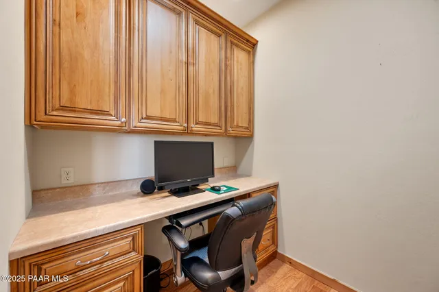 a kitchen with a sink and a refrigerator