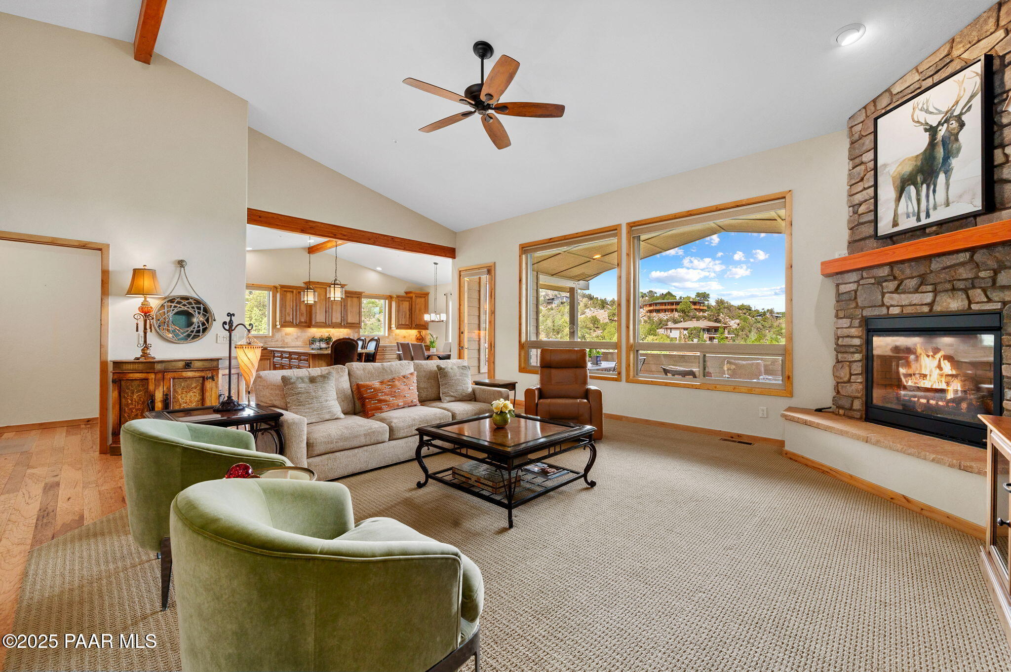 2214 Lichen Ridge Lane Prescott, AZ 86303 - Photo 5 of 46 a living room with furniture and a fireplace