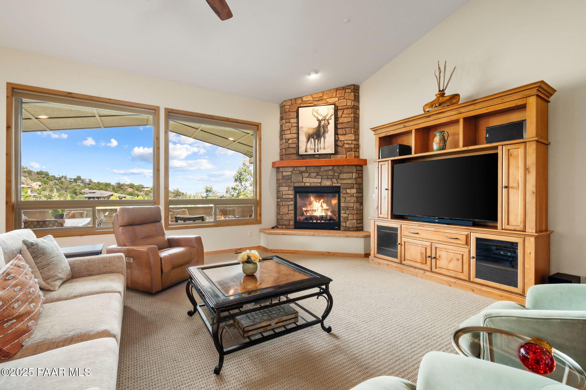 2214 Lichen Ridge Lane Prescott, AZ 86303 - Photo 6 of 46 a living room with furniture fireplace and flat screen tv