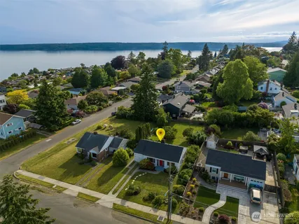 an aerial view of a house with a garden