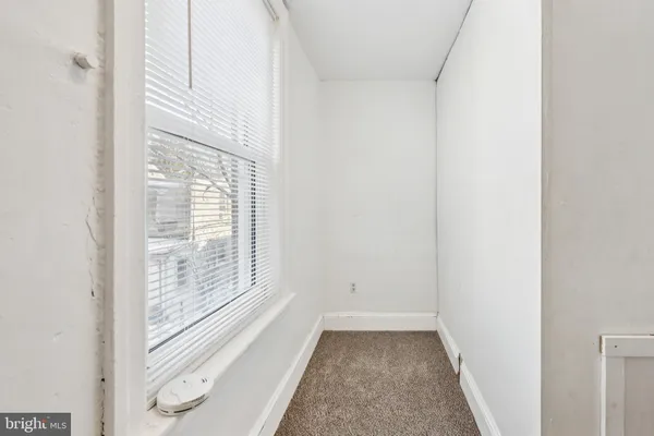 a view of a small space with a window