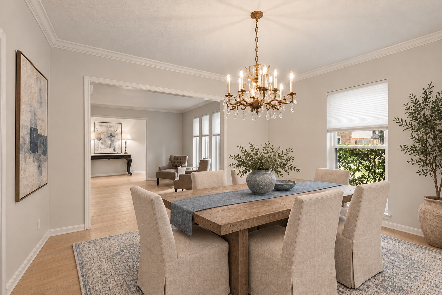 9203 Godstone Lane Spring, TX 77379 - Photo 7 of 38 The Formal Dining Room measures 13 x 11, providing plenty of room for casual weeknight dinners and large-scale entertainment. You’ll appreciate the view of the front gardens and warm, filtered morning sun. The chandelier and custom millwork make a grand statement. Image has been virtually staged.