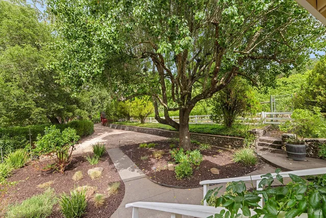 a backyard of a house with seating space