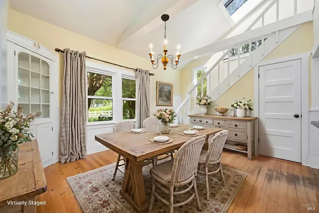 a bedroom with a bed and a potted plant