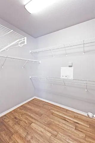 a view of a room with racks on the wall