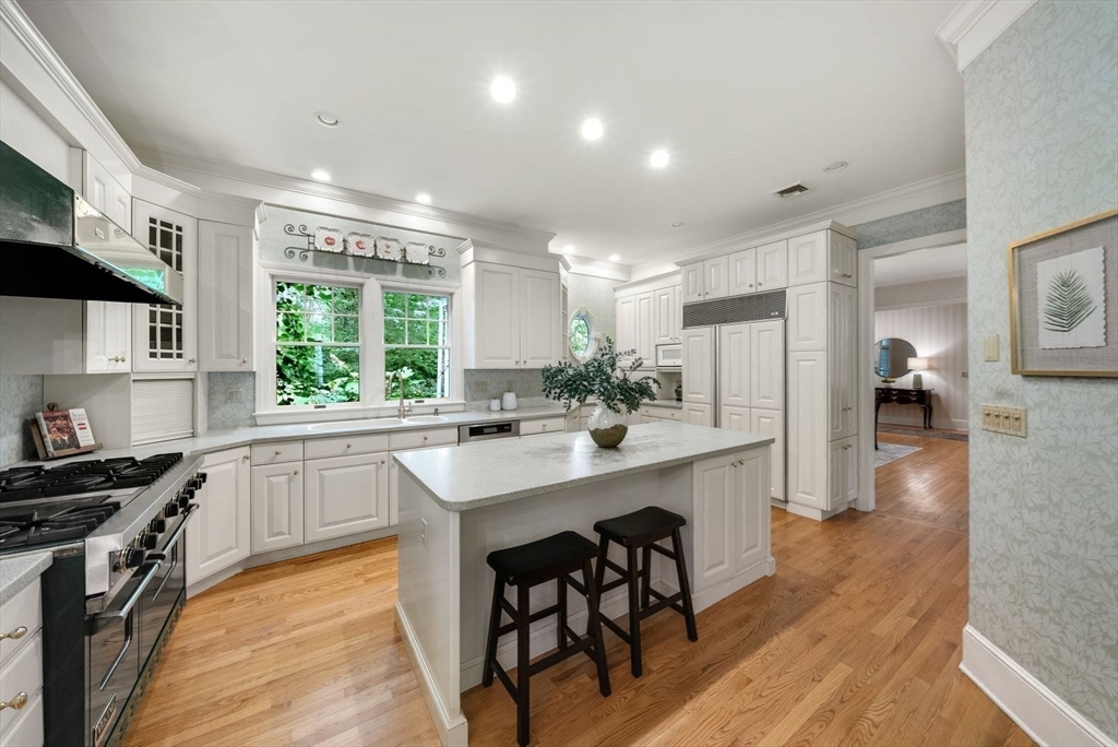 364 Hickory Road North Attleboro, MA 02760 - Photo 13 of 40 a kitchen with stainless steel appliances granite countertop a sink stove and refrigerator